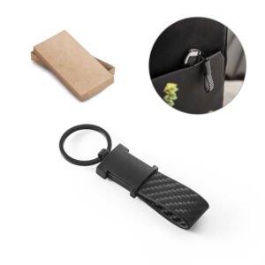 Chaveiro em c. sintético com textura em fibra de carbono e metal